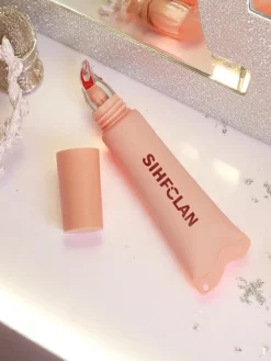 New Błyszczyk do ust z bransoletką Gloss & Charm Cocoa Cookie Usta