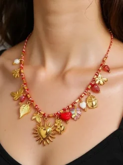 Outlet Naszyjnik pozłacany Calista Charmella z zawieszkami z żywicy Damskie Biżuteria