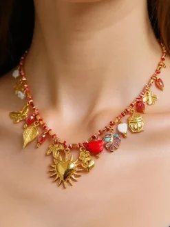 Outlet Naszyjnik pozłacany Calista Charmella z zawieszkami z żywicy Damskie Biżuteria