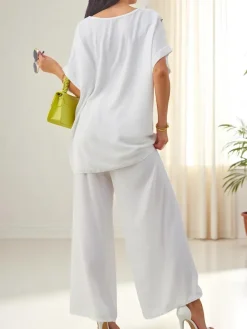 Bawełniany damski komplet z krótkim rękawem i poszerzanymi spodniami Damskie Komplety Damskie