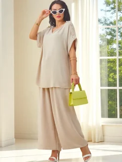 Bawełniany damski komplet z krótkim rękawem i poszerzanymi spodniami Damskie Komplety Damskie