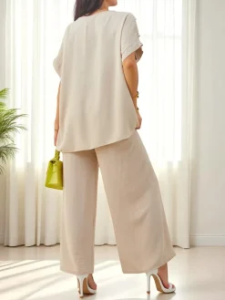 Bawełniany damski komplet z krótkim rękawem i poszerzanymi spodniami Damskie Komplety Damskie