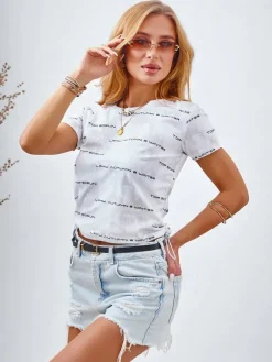 Best Bawełniany damski t-shirt ze ściągaczami po bokach, napisami i brokatem Bluzki / Koszule / Koszulki