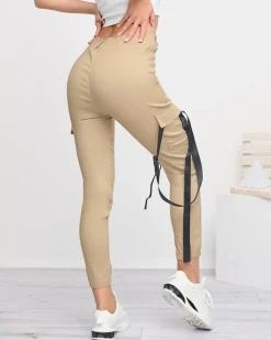 Online Beżowe damskie spodnie bojówki z paskiem Spodnie Cargo