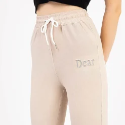 New Beżowe damskie spodnie materiałowe z naszywką Spodnie Materiałowe
