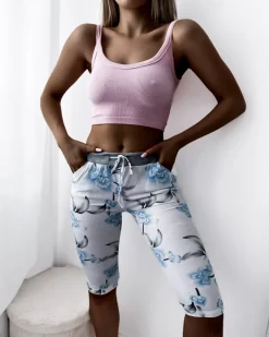 Sale Białe damskie spodenki 3/4 z kwiatowym wzorem Spodenki 3/4|Krótkie Spodenki