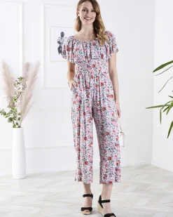 Online Biało- długi kombinezon damski w kwiaty Kombinezony