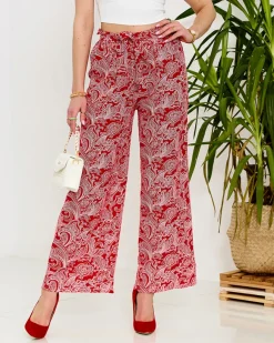 Online Czerwone damskie spodnie materiałowe z printem Spodnie Materiałowe
