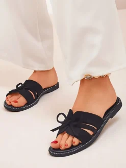 Clearance Damskie klapki na płaskiej podeszwie z kokardką Gerber Klapki Płaskie