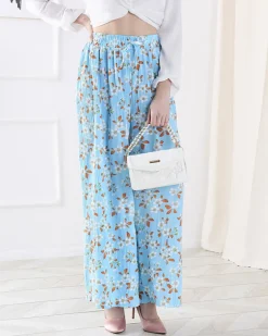 Sale Damskie niebieskie spodnie materiałowe w kwiatki Spodnie Materiałowe