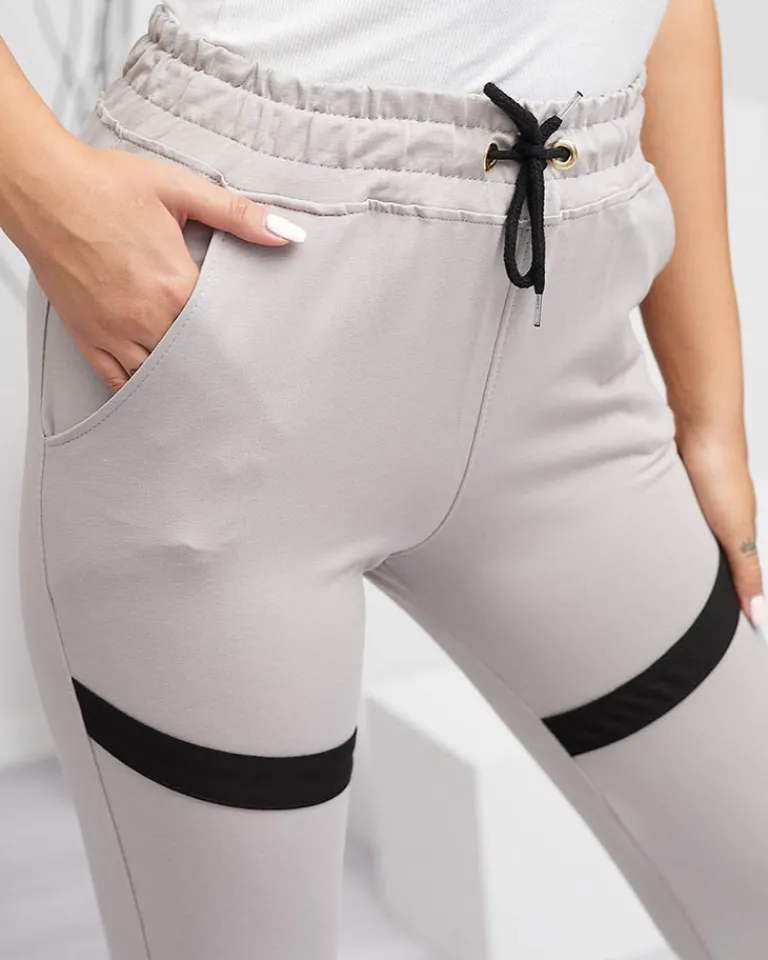 Clearance Damskie spodnie dresowe w kolorze jasnoszarym Spodnie Dresowe