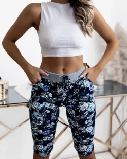 Clearance Damskie spodenki 3/4 w m kolorze i w kwiaty Spodenki 3/4|Krótkie Spodenki