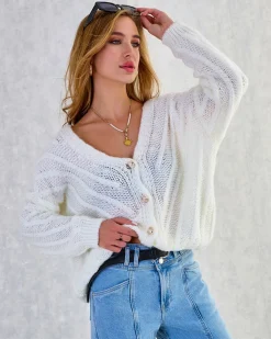 Sale Dzianinowy damski sweterek z guzikami Swetry