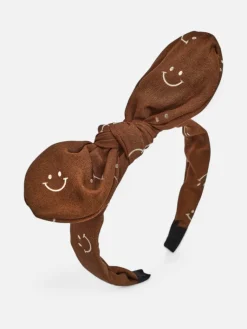 Best Dziecięca opaska do włosów z kokardką z printem w uśmiechnięte buźki Damskie Akcesoria Do Włosów