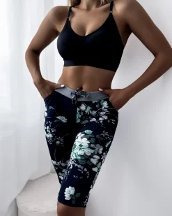 Best Granatowe spodenki damskie 3/4 w zielone kwiaty Spodenki 3/4|Krótkie Spodenki