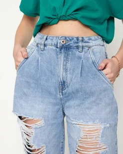 Discount Jasnoniebieskie damskie spodnie jeansowe z dziurami Jeansy