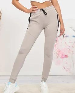 Jasnoszare damskie spodnie dresowe z czarnymi wstawkami Spodnie Dresowe