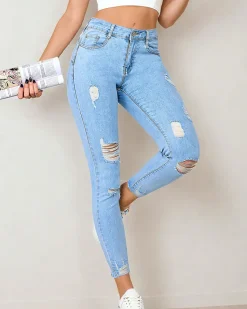 New Jeansy damskie typu rurki z przetarciami Jeansy