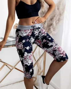 Discount Kwiatowe spodenki damskie 3/4 w kolorze granatowo- koralowym Spodenki 3/4|Krótkie Spodenki