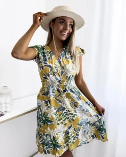 Outlet Musztardowa sukienka damska mini z printem w kwiaty Sukienki Letnie|Sukienki Krótkie