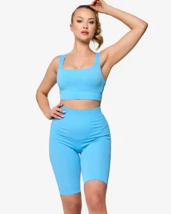 Clearance Niebieski damski komplet sportowy w prążki PLUS SIZE Damskie Komplety Damskie