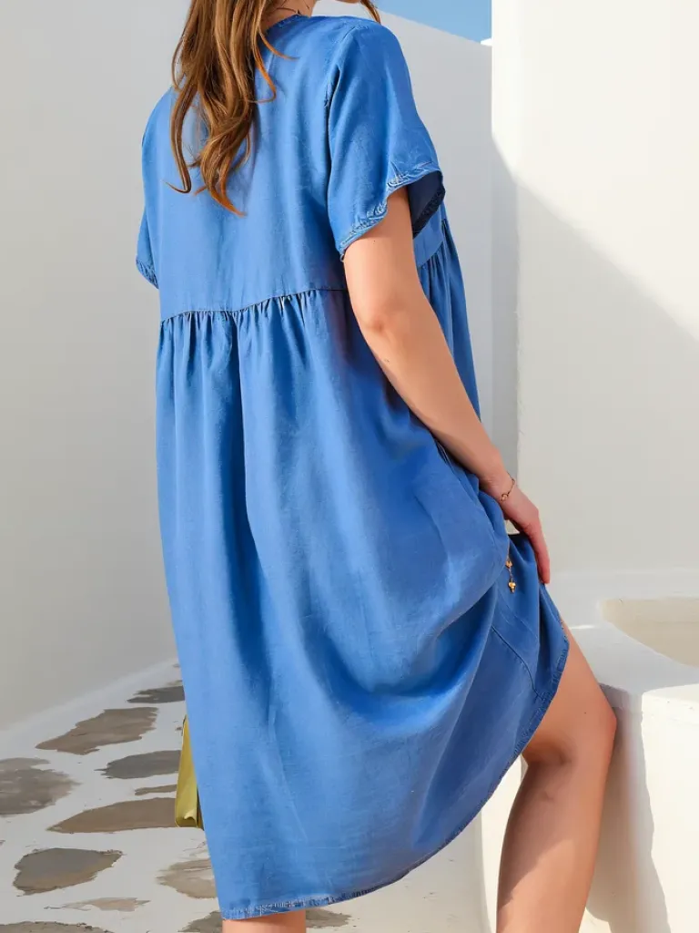 Outlet Prosta damska tunika a'la sukienka z ozdobnymi guzikami typu jeansowa Bluzki / Koszule / Koszulki