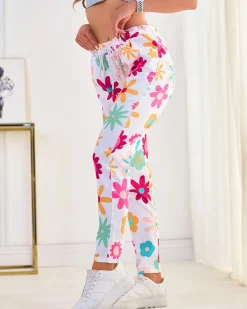 Spodnie damskie materiałowe w kwiaty Spodnie Materiałowe