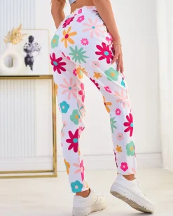 Spodnie damskie materiałowe w kwiaty Spodnie Materiałowe