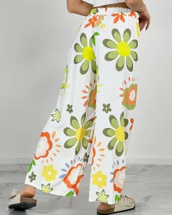 Szerokie spodnie damskie materiałowe w kwiaty Spodnie Materiałowe