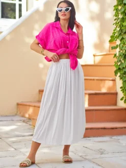 Wiskozowa Damska spódnica midi letnia i zwiewna z dwoma kieszeniami Spódnice