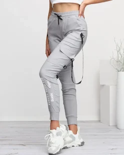 Szare damskie spodnie typu bojówki z napisami - Odzież Spodnie Cargo